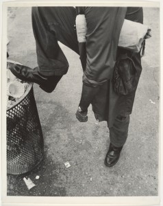 Street Scene: Man Resting Foot on Lip of Trashcan, New York City, 1970s