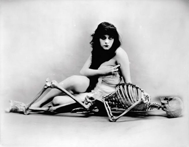 Theda Bara with skeleton